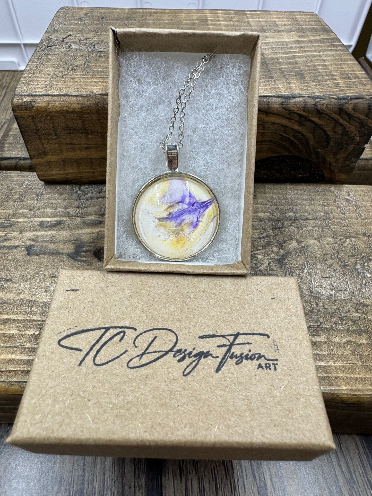 Hand dipped fluid art silver pendant